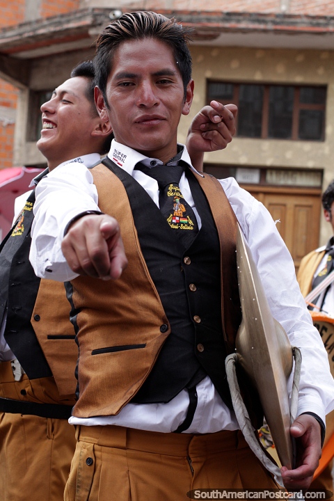 Brass band from Potosi has fun at the Sucre carnival. (480x720px). Bolivia, South America.
