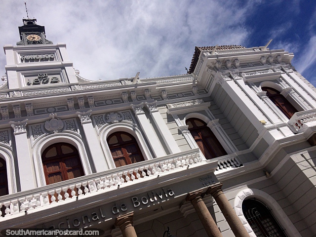 Historic building of the Bolivia National Bank (1872) in Sucre with arches and wooden doors. (640x480px). Bolivia, South America.