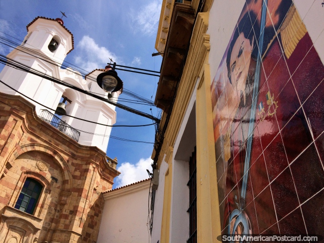 San Felipe Neri Temple in Sucre towers over the city street, man with a sword artwork. (640x480px). Bolivia, South America.