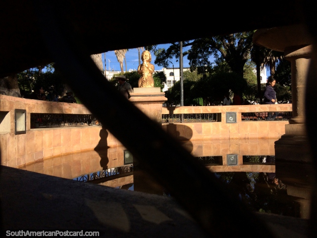 Golden figure in the fountain at Plaza 25th of May in Sucre, nice sunlight. (640x480px). Bolivia, South America.