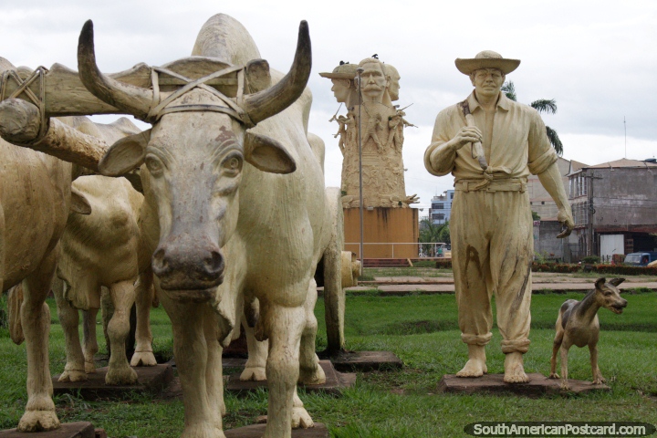 Hombre con sus vacas de labranza y perro leal, monumento en Cobija. (720x480px). Bolivia, Sudamerica.