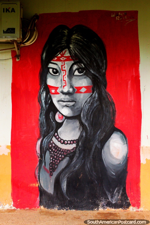 Indigenous woman with face paint a necklace of beads, street art in Cobija. (480x720px). Bolivia, South America.