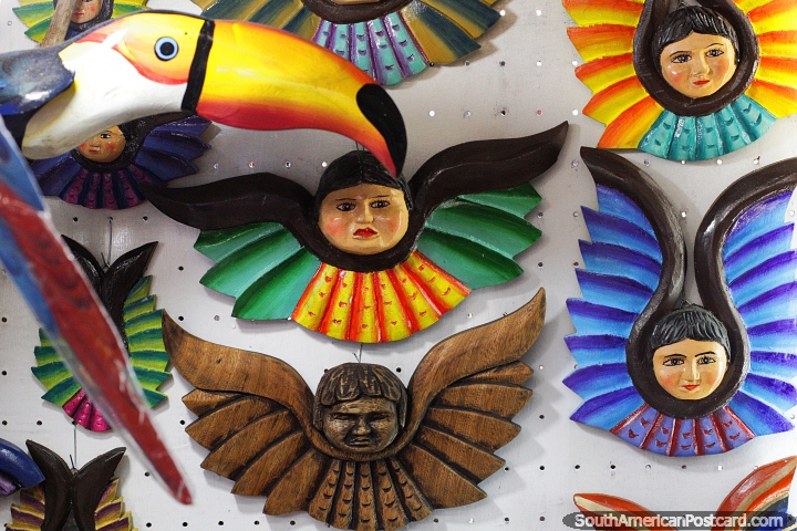 Flying faces and a wooden toucan, arts and crafts in central Santa Cruz. (720x480px). Bolivia, South America.