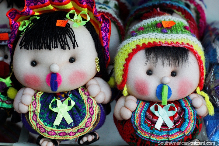 Small baby dolls sucking dummies, you see these figures all around Bolivia, crafts walkway in Santa Cruz. (720x480px). Bolivia, South America.
