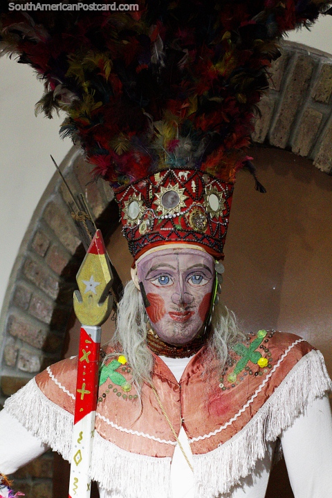 Costume of the Toba from 1970, mask, spear and feathers, Anthropological Museum, Oruro. (480x720px). Bolivia, South America.