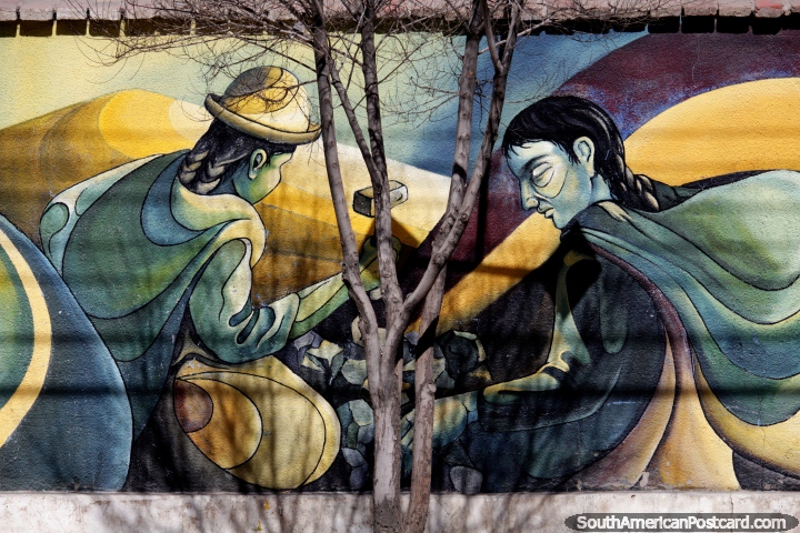 2 women crush rocks with hammers, mining is the theme of this street art in Oruro. (720x480px). Bolivia, South America.