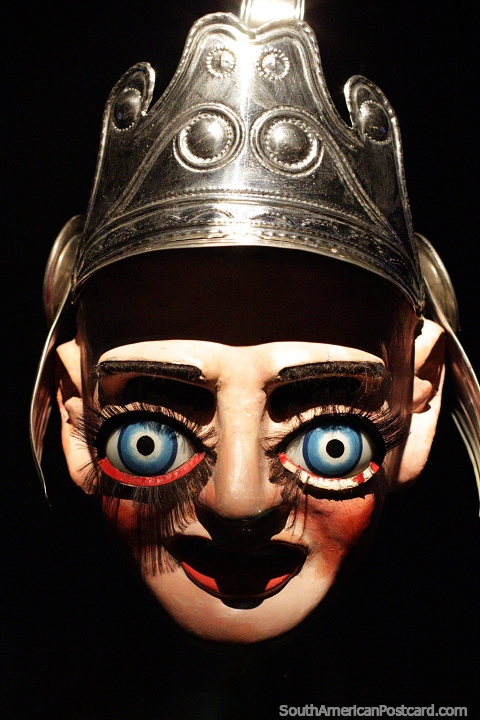 Archangel San Miguel with metal helmet, 20th century mask from the La Paz region, Musef museum, La Paz. (480x720px). Bolivia, South America.