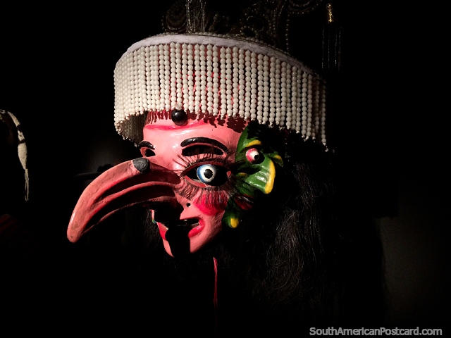 Beautiful mask with a long pointy nose, head wear of beads, on display at the Musef museum, La Paz. (640x480px). Bolivia, South America.