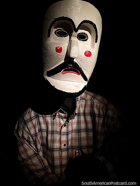 White mask with red cheeks wearing a checkered shirt, Musef museum, La Paz. (480x640px). Bolivia, South America.