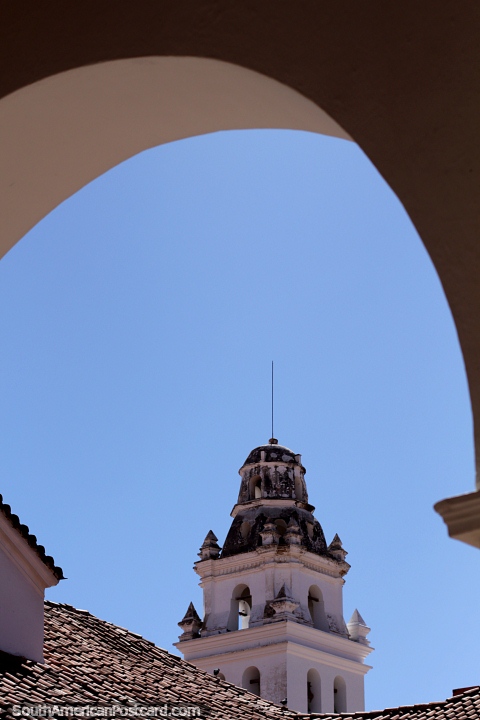 Santa Monica church in Sucre, view through an archway at Freedom House. (480x720px). Bolivia, South America.