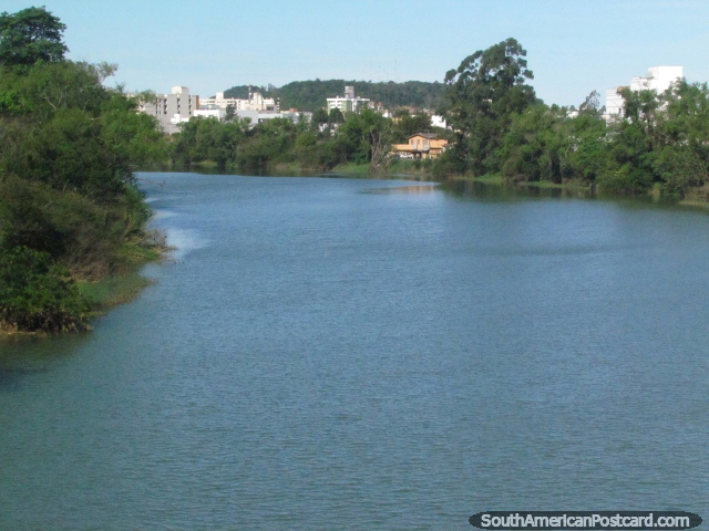 The river Rio Pinheirinho, crossing over the bridge in Ararangua. (640x480px). Brazil, South America.