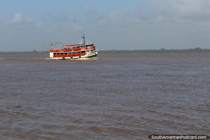 B/M Meruu, an orange ferry on the river in Belem. (720x480px). Brazil, South America.