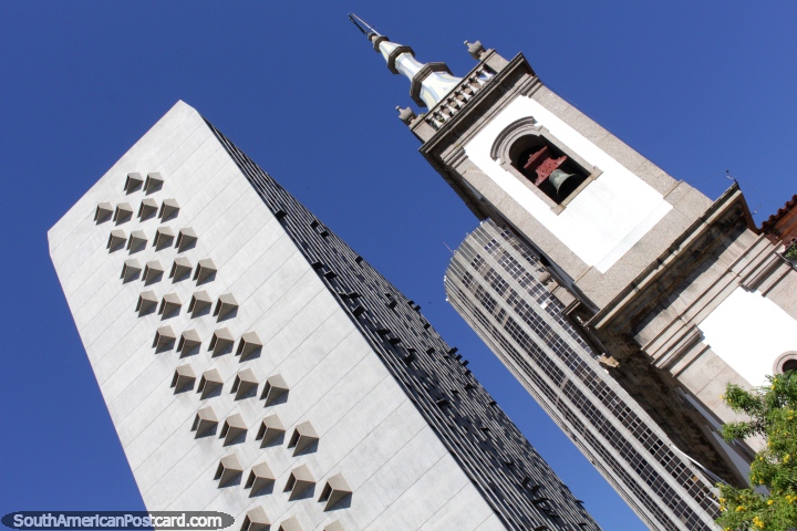 Church tower and bell beside amazing modern structures in Rio de Janeiro. (720x480px). Brazil, South America.
