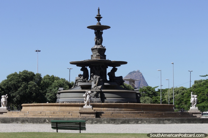 Fountain at Plaza Mahatma Gandhi, Sugarloaf Mountain behind, Rio de Janeiro. (720x480px). Brazil, South America.