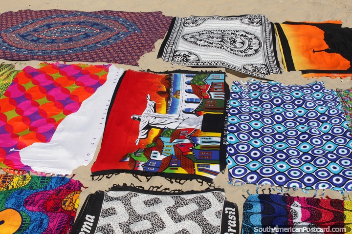 Colorful beach towels to sit on for sale at Ipanema Beach in Rio de Janeiro. (720x480px). Brazil, South America.