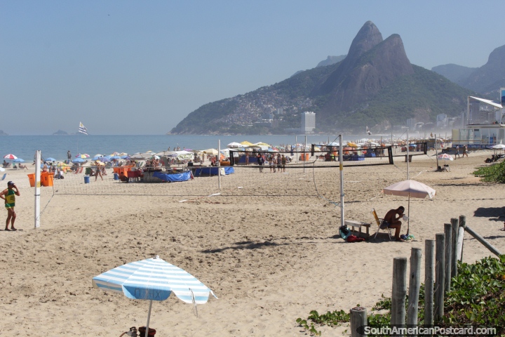 The crowds come to Ipanema beach for surf, sand and fun, Rio de Janeiro. (720x480px). Brazil, South America.