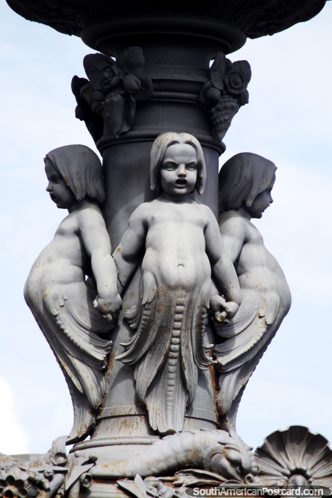 3 angels look a little like Chucky, scary, fountain in Salvador. (480x720px). Brazil, South America.