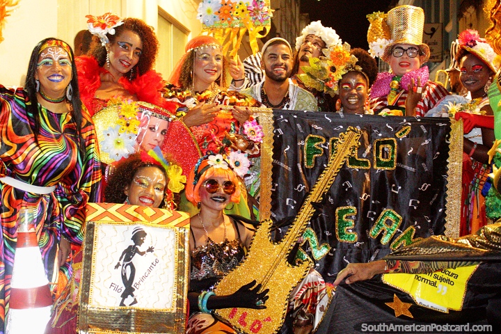 An extremely dressed-up and colorful group of people enjoying the carnival in Salvador. (720x480px). Brazil, South America.