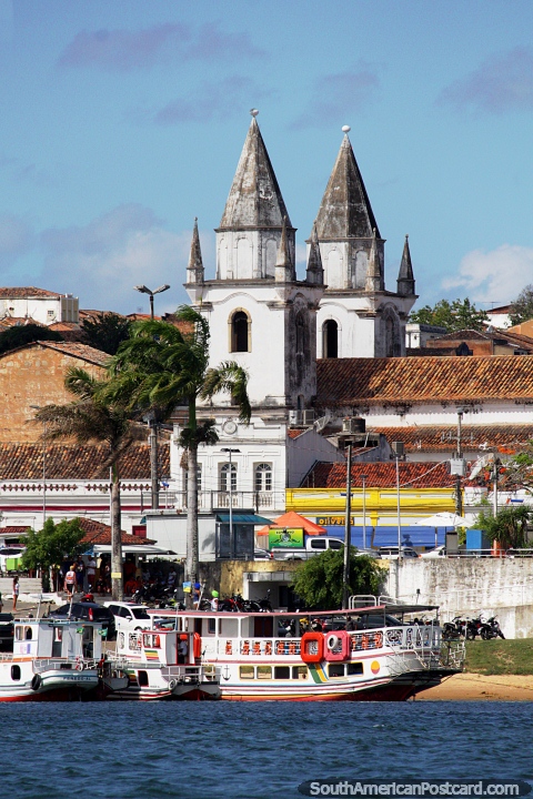 The white towers of the church, great view from the river in Penedo. (480x720px). Brazil, South America.