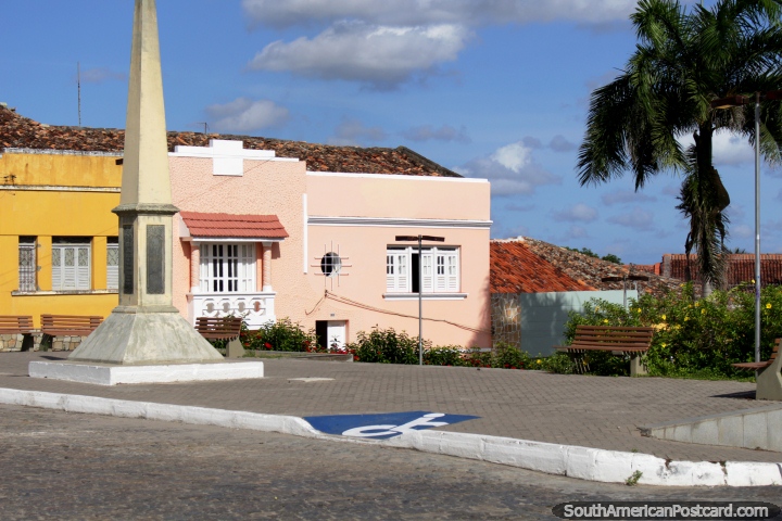 Monument, houses and palm tree at the top of the historical hill in Penedo. (720x480px). Brazil, South America.