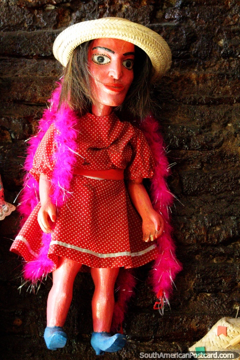 Pink doll with scarf and straw hat on display at Teatro Mamulengo in Recife. (480x720px). Brazil, South America.
