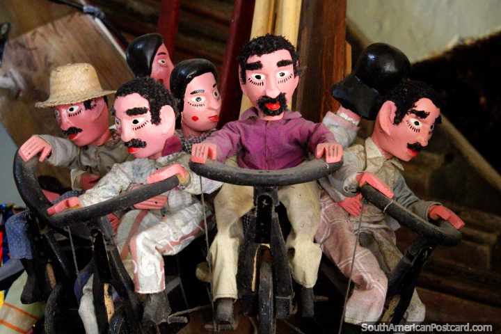 Little wooden men on bicycles on show at Teatro Mamulengo in Recife. (720x480px). Brazil, South America.