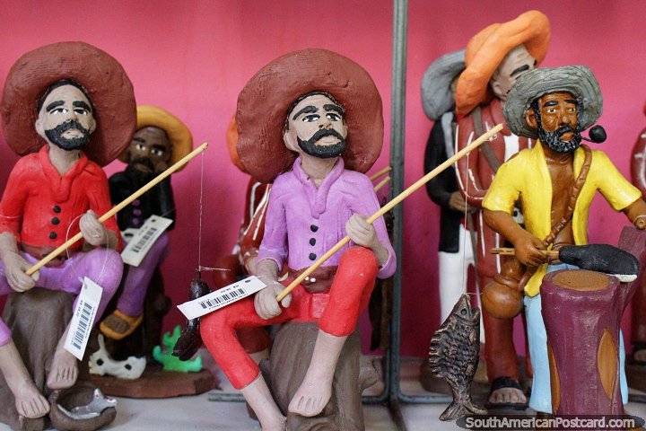 Ceramic fishermen make a catch, visit the art shops in Olinda. (720x480px). Brazil, South America.