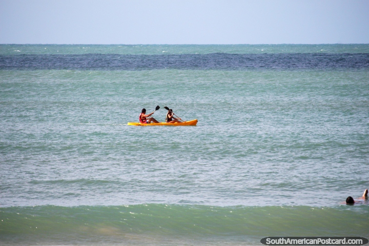 Rent a kayak and look for dolphins at the beach in Pipa. (720x480px). Brazil, South America.