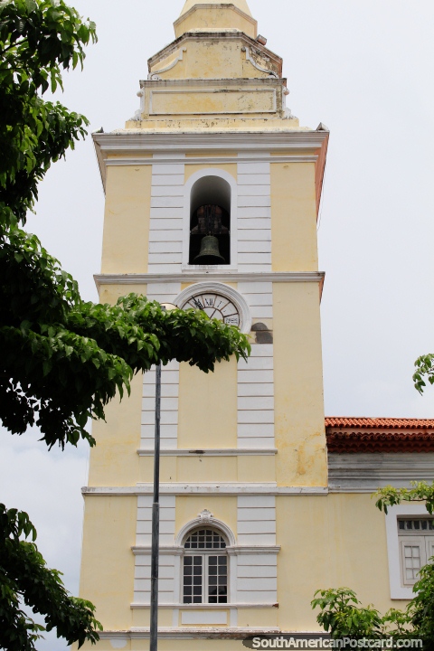 Clock tower of Igreja da Se church, close view of the yellow tower in Sao Luis. (480x720px). Brazil, South America.