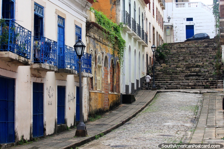 The cobblestone streets of Sao Luis have iron balconies and interesting sights to see along the way. (720x480px). Brazil, South America.