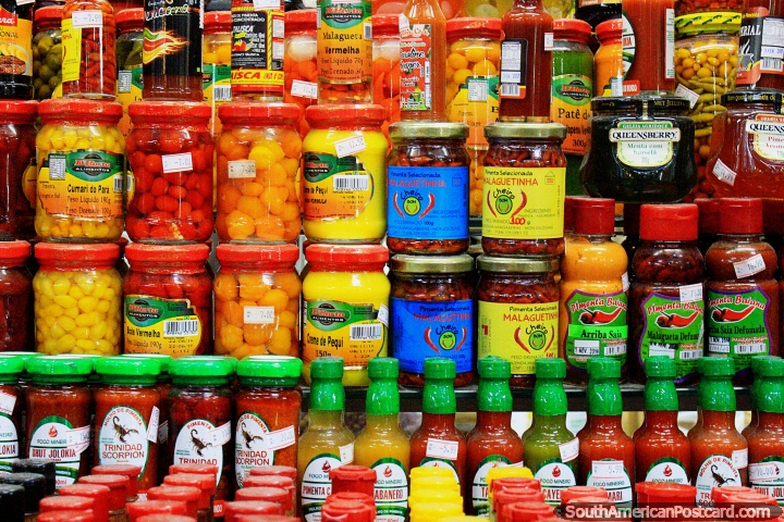 Jars and bottles of pastes and pickles and flavors for food and cooking, Central Market, Belo Horizonte. (720x480px). Brazil, South America.
