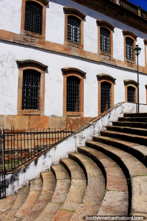 Curved stairs, symmetrical windows and iron, the architecture in Ouro Preto is beautiful. (480x720px). Brazil, South America.