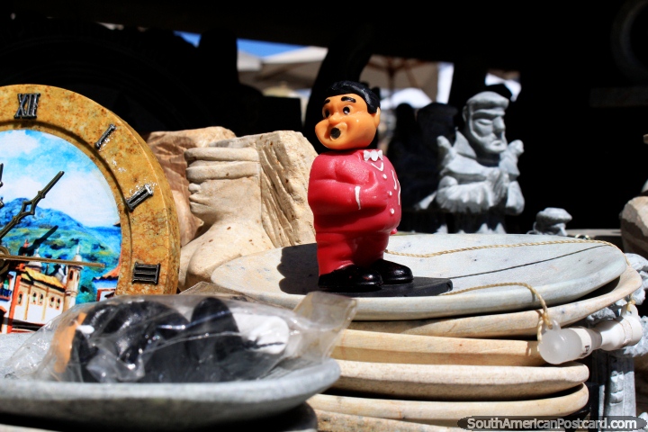 A little red man and other assorted items at the outdoor market in Ouro Preto. (720x480px). Brazil, South America.