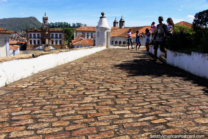 Resembles a fortress, the cobblestone ramp of the Science Museum and distant Baroque buildings in Ouro Preto. (720x480px). Brazil, South America.