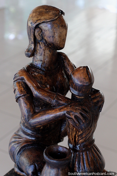 Sculptured work made of wood by Sil Seles, title Afeto, on display at Memorial Dos Autonomistas, Rio Branco. (480x720px). Brazil, South America.