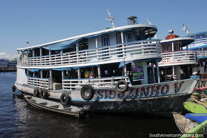 Passenger ferries docked on the river at the port in Manaus. (720x480px). Brazil, South America.