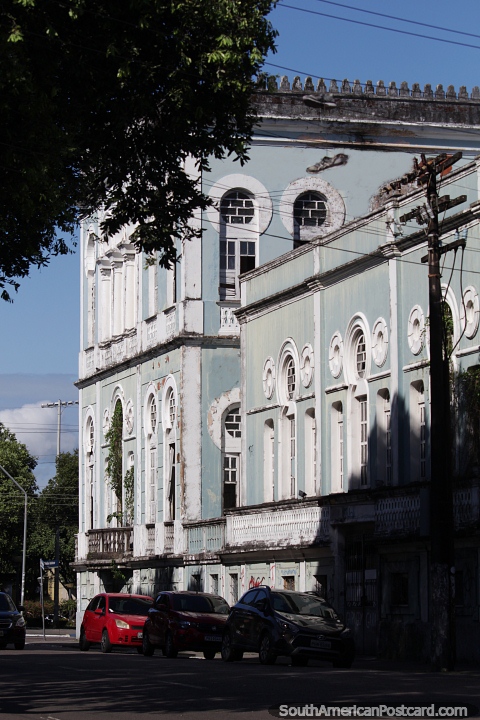 Antique building with round windows in Manaus. (480x720px). Brazil, South America.