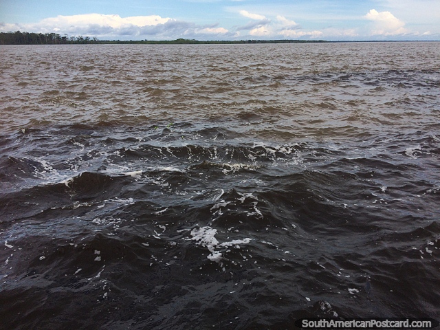 Meeting of the Waters in Manaus, Negro River (black) and The Amazon River (white). (640x480px). Brazil, South America.