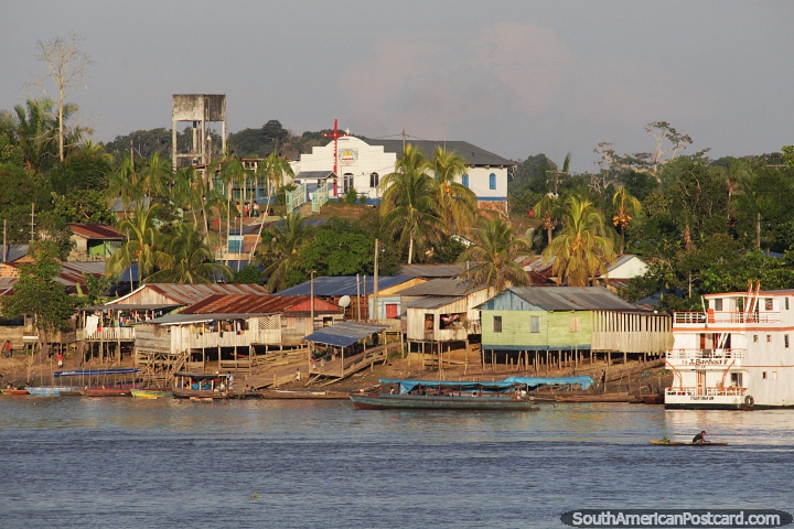 Sejam, a town in the Amazon with a white church and red cross on the hilltop. (720x480px). Brazil, South America.
