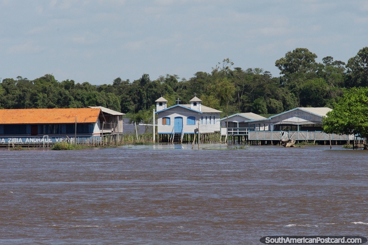 Arrive at the church door by boat when river waters are higher than normal, the Amazon. (720x480px). Brazil, South America.