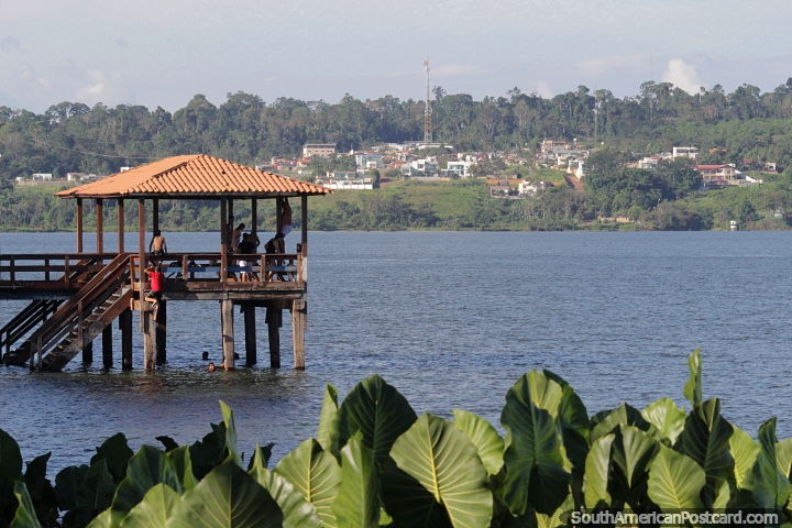 Young people jump off the wharf into the river in the Amazon city of Altamira. (720x480px). Brazil, South America.