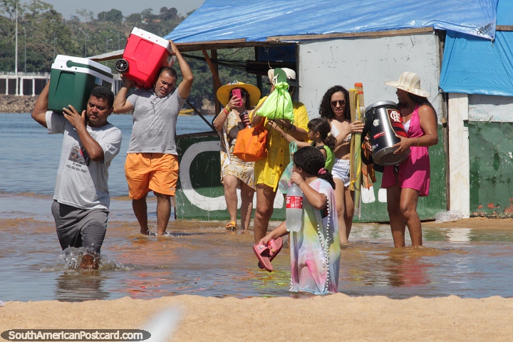 People arrive prepared for a day at the beach island in Maraba. (720x480px). Brazil, South America.