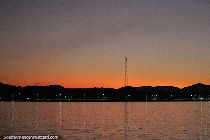 An orange glow sets over Filadelfia at sunset beside the Tocantins River. (720x480px). Brazil, South America.