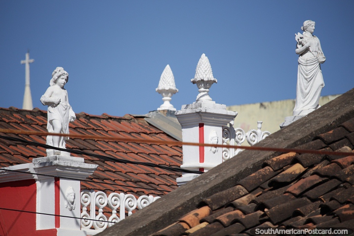 White statues at the top of the old buildings in Barreiras. (720x480px). Brazil, South America.