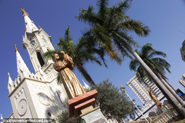 Metropolitan Cathedral of Uberaba with gold statue and palm trees. (720x480px). Brazil, South America.