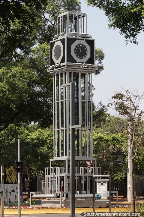 A steel clock tower in the plaza in Campo Grande. (480x720px). Brazil, South America.