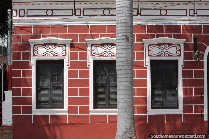 Well-kept antique facade of a bar in Corumba with decorated windows. (720x480px). Brazil, South America.