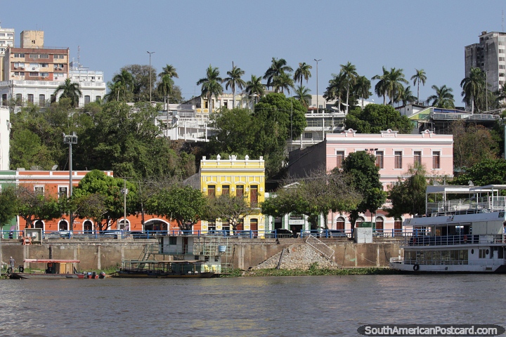 Waterfront in Corumba with historic buildings painted in bright colors, view from the river. (720x480px). Brazil, South America.