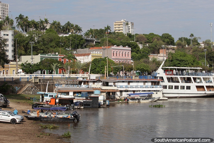The awesome waterfront in Corumba with boats, historic center and many trees. (720x480px). Brazil, South America.