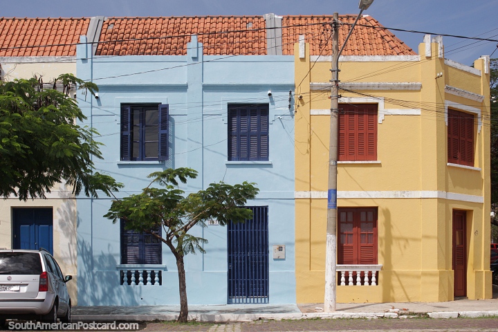 Colorful houses with wooden window shutters in Corumba. (720x480px). Brazil, South America.